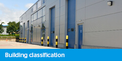 Building classification elearning - shuttered loading bays exterior of warehouse